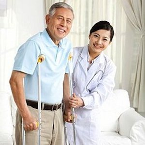 Family doctor and senior patient