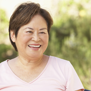 Smiling Senior Woman In Garden