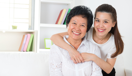 Senior woman and daughter. Happy Asian family senior mother and adult offspring having fun time at h