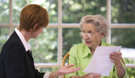 Senior woman meeting with agent