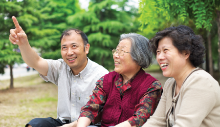 son and daughter with their elderly parent