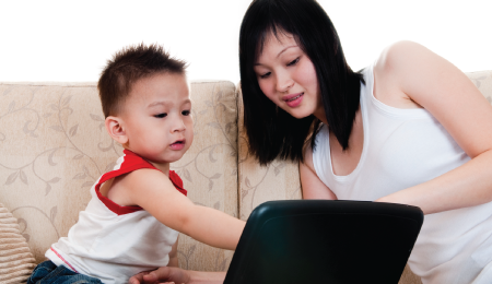 child and mother surfing the web